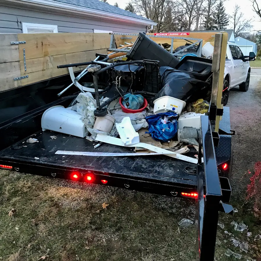 Roll-off dumpster delivered to a residential driveway in Ambridge